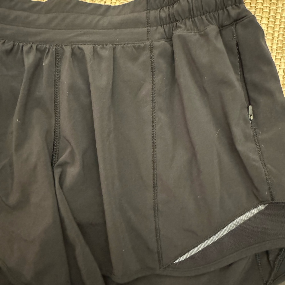 Lulu lemon hottie hot shorts 4” size 8. Black. Comes with bag! - Picture 4 of 6